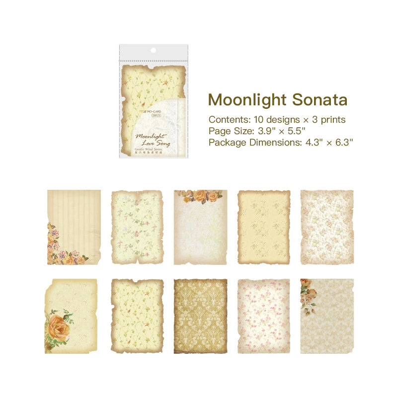 Cream vintage paper sheets with small florals, lace, and stripes, ten warm designs with aged burnt edges in a clear pack.