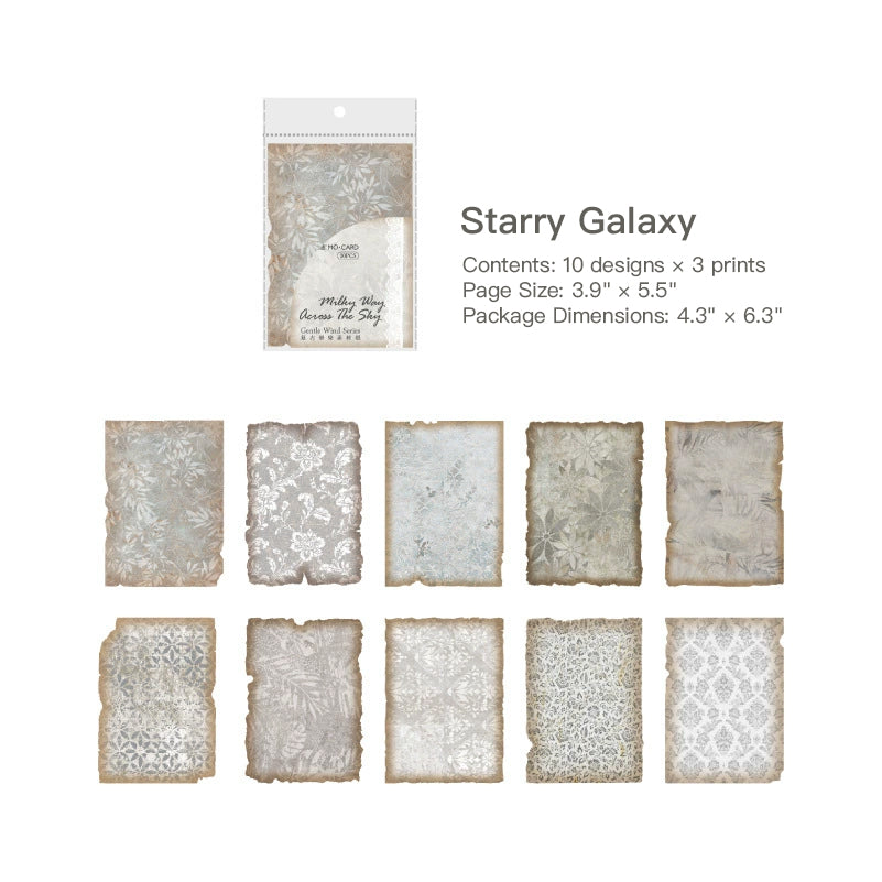 Silver-grey vintage paper sheets with leaf, floral, and lace patterns, ten muted designs with aged burnt edges in a clear pack.