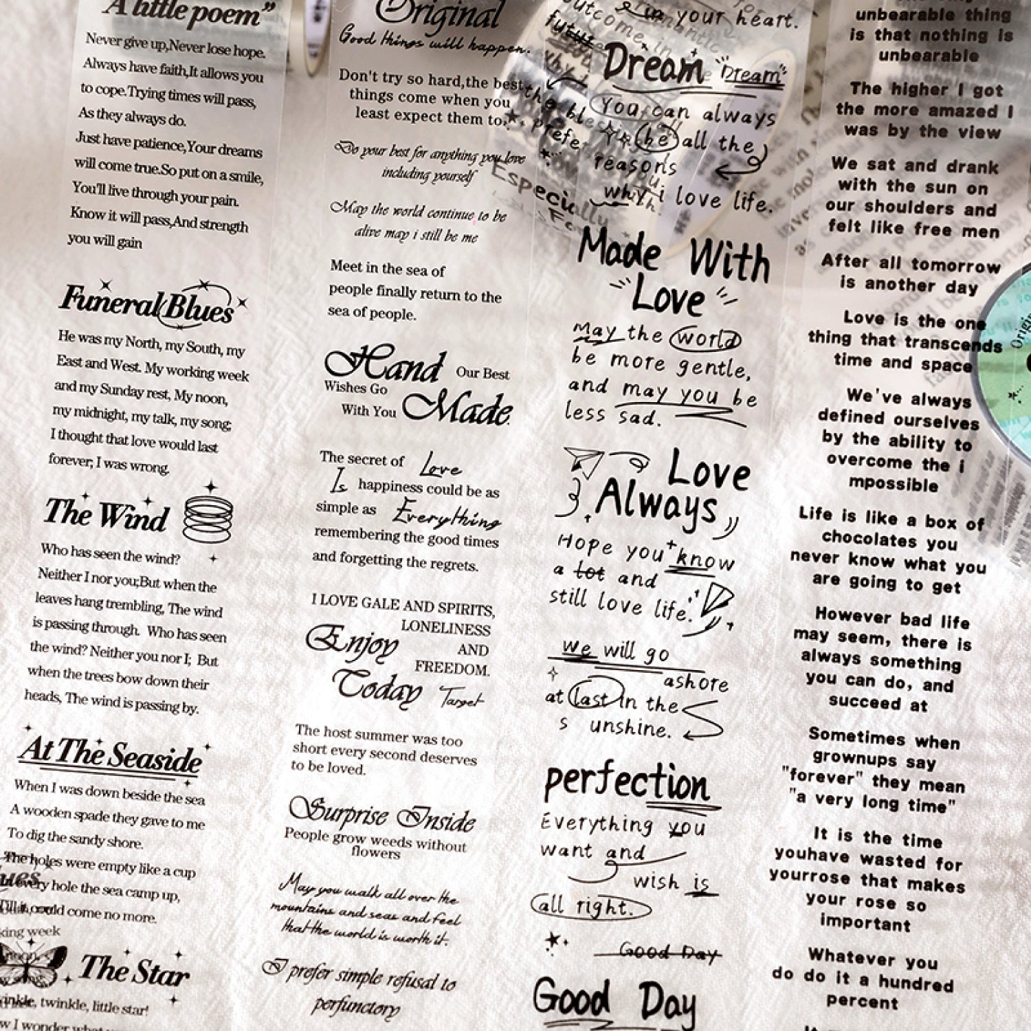 Collage of vintage script PET tape pieces with assorted English phrases, poems, and motivational quotes on aged paper.
