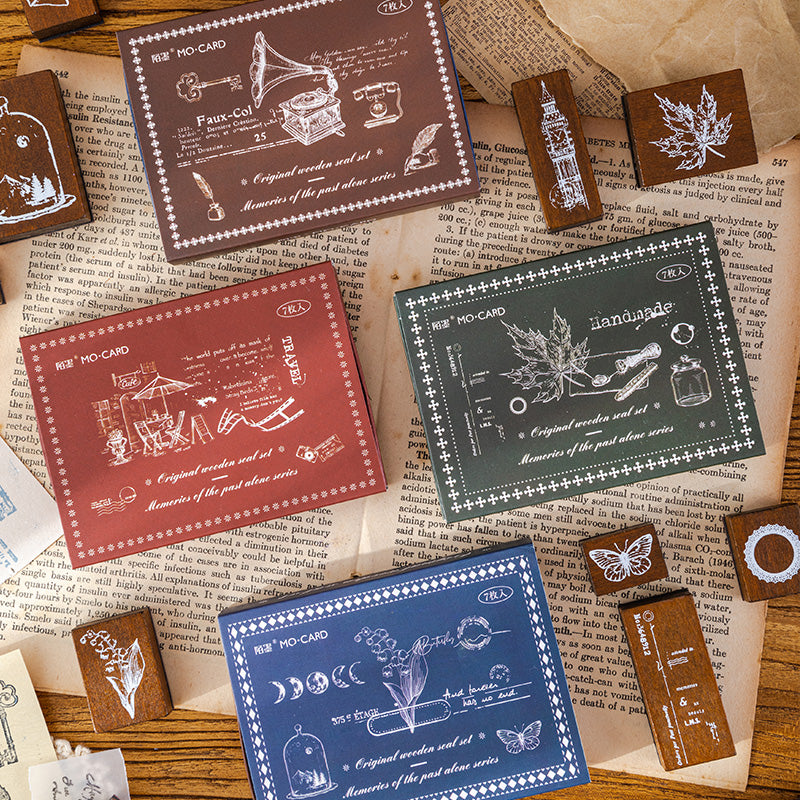 Four vintage wooden stamp sets with nature and memory themed rubber faces