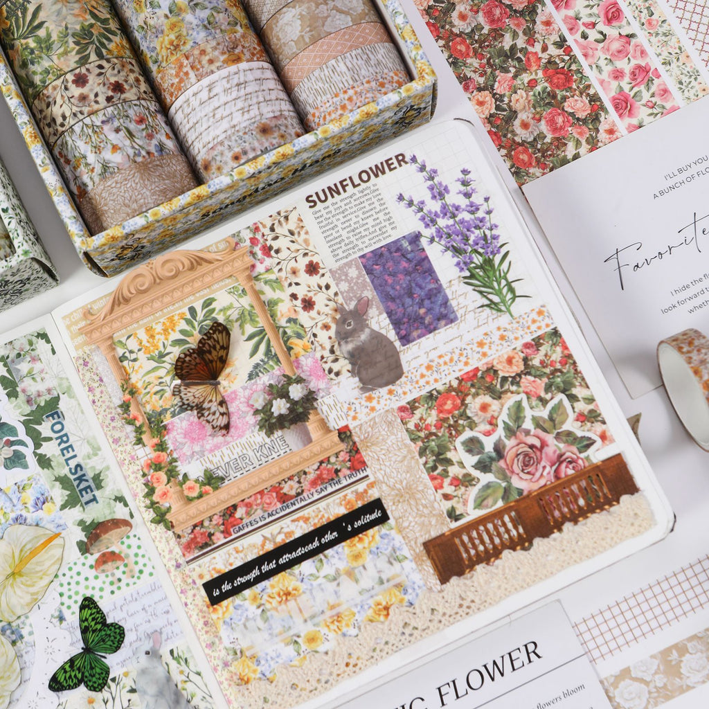 Floral Whisper washi tapes used in a vintage journal spread, layered with floral ephemera cards and botanical stickers on aged paper
