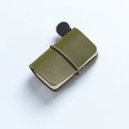 Olive waxed leather mini traveler's notebook charm with elastic band and vintage metal clasp