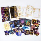 Dark purple celestial whale sticker set flat lay with galaxy planets and gold foil stars for space theme journaling