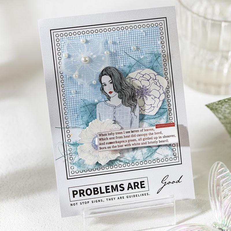 Blue fishnet and sequin textured paper collage card with floral ephemera and pearl accents