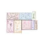 A Curtain of Stars stamp gift boxes in eight colors – chain, bead and gem designs, one beech stamp per box