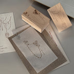 Curtain of Stars wood stamp with gift box in a desk tray – vintage journaling supplies
