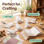 Border punch on wooden desk with gift tags pocket inserts A7 M5 journals and washi tape