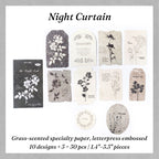 Noir embossed botanical paper stickers with white flower letterpress on dark specialty paper for dark academia spreads