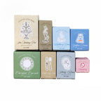 Floating Light Imprint stamp gift boxes in eight colors – one beech wood stamp per box