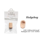 Hedgehog hand-drawn wooden stamp, beech wood handle with spiky animal rubber face for forest journaling.