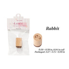 Rabbit hand-drawn wooden stamp, beech wood handle with bunny rubber face for forest journaling spreads.