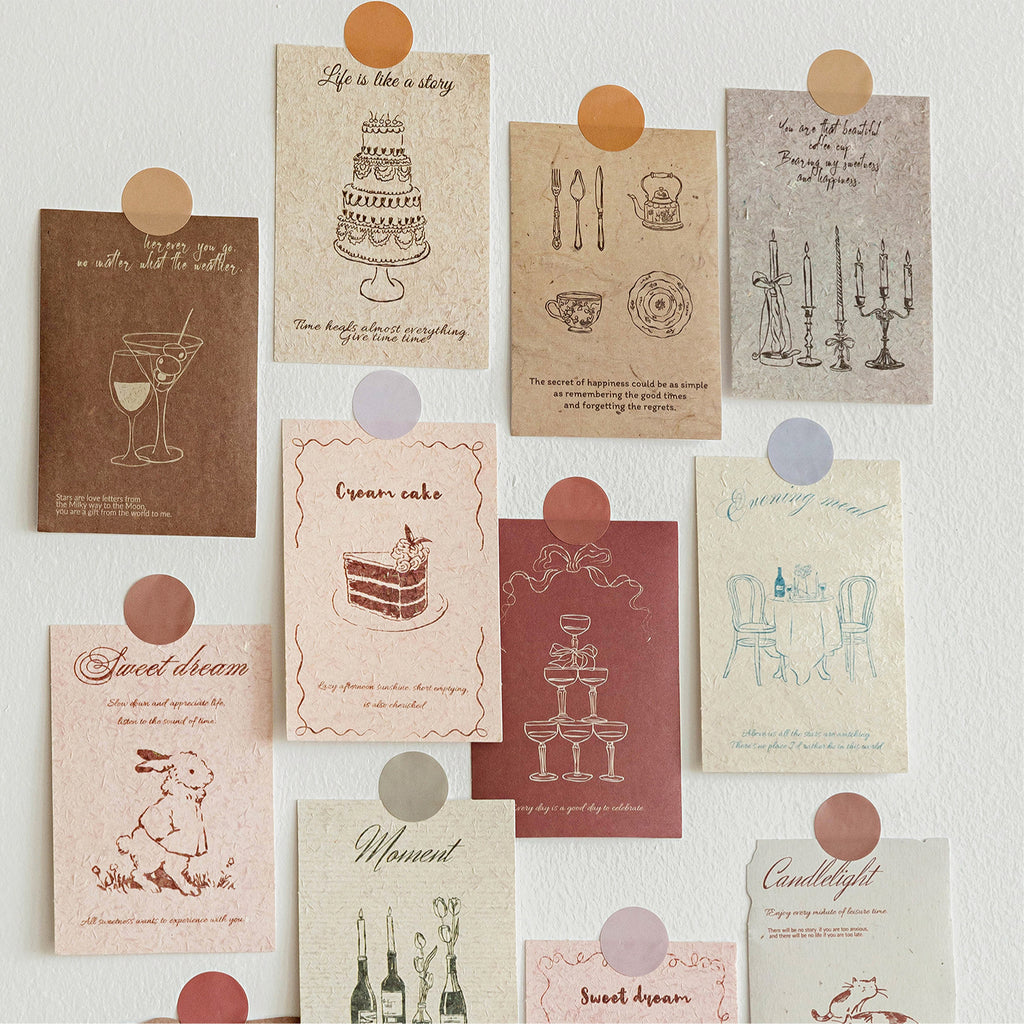 Vintage textured journal cards pinned on white wall with round stickers mood board decor inspiration
