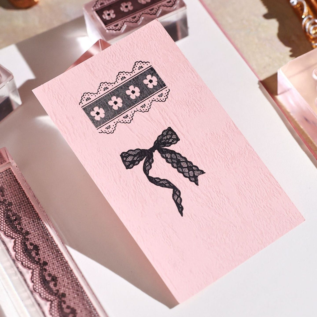 lace reverie bow acrylic stamp standing on pink box clear vintage stamp