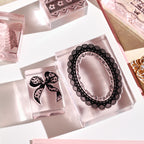 lace reverie stamp impressions black lace bow and oval wreath on paper