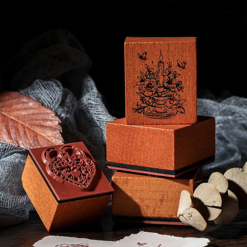 Macro close-up of the deep-etched red rubber die of a Dreams Under the Moon wooden stamp. Shows the intricate detailed pattern of a mystical moon rabbit and floral design resting on a smooth wood slice.