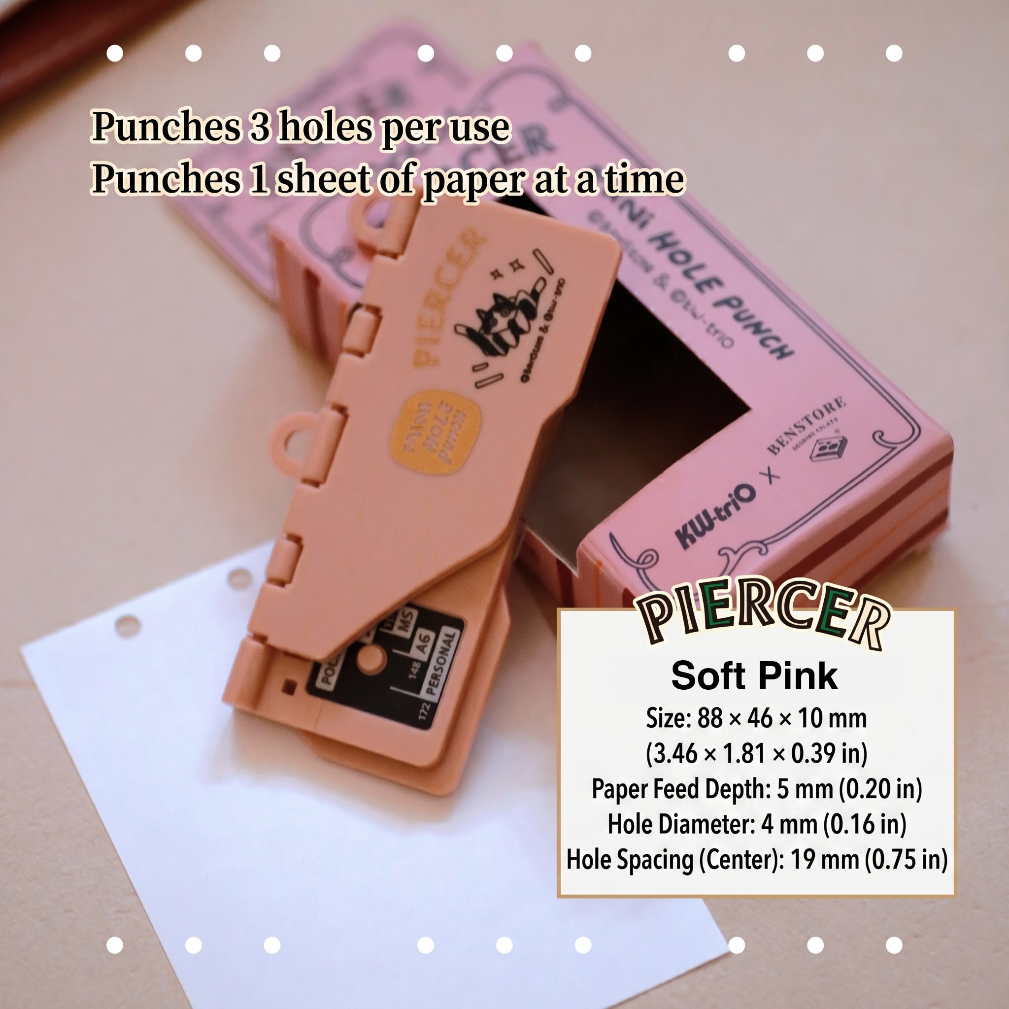 Soft pink portable 6-hole planner punch, compact plastic body with alignment ruler for ring journals.