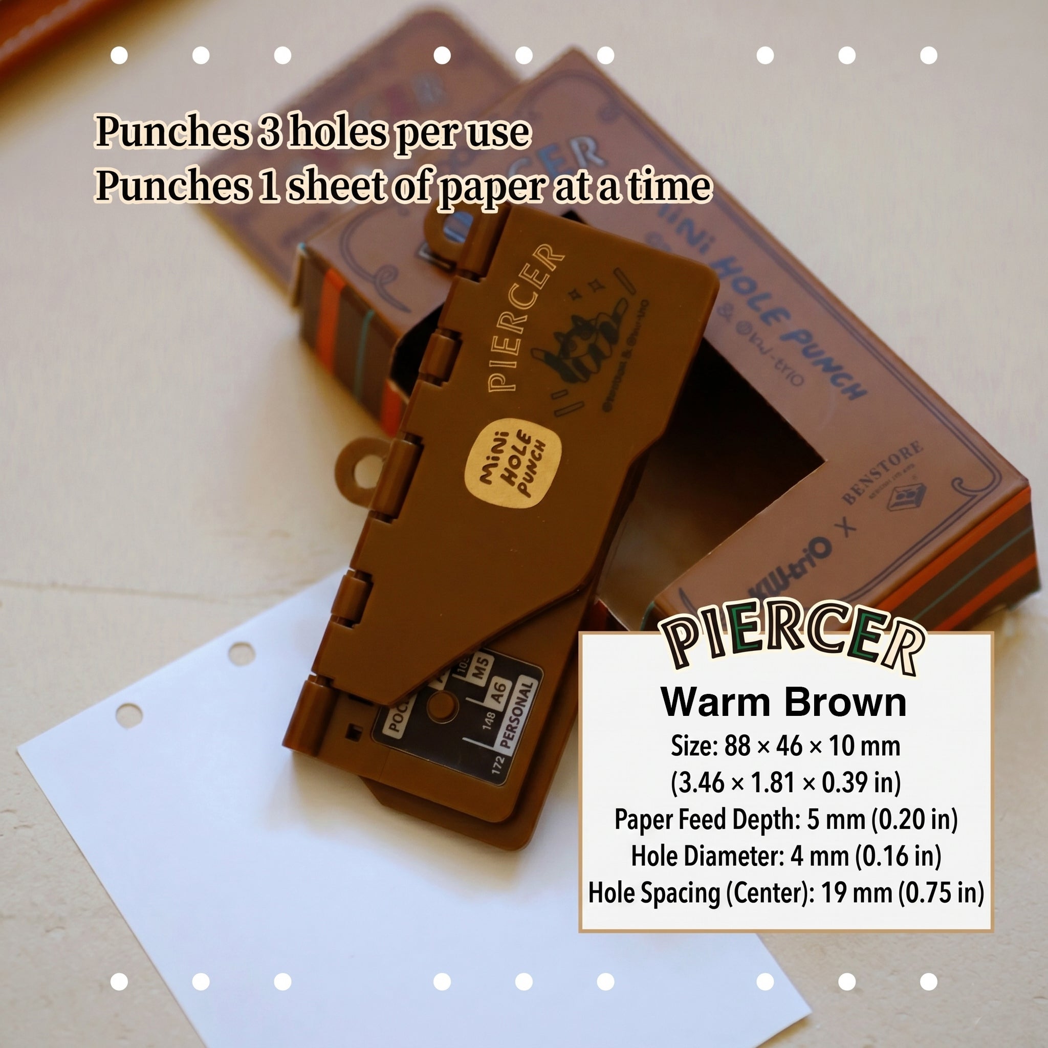 Warm brown portable 6-hole planner punch, compact plastic body with alignment guide for ring planners.
