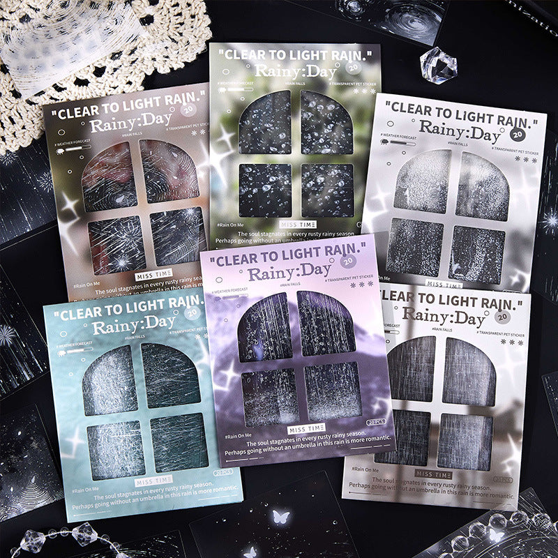 Six-color rainy day PET transparent sticker set displayed with packaging on dark background for aesthetic journaling and scrapbooking