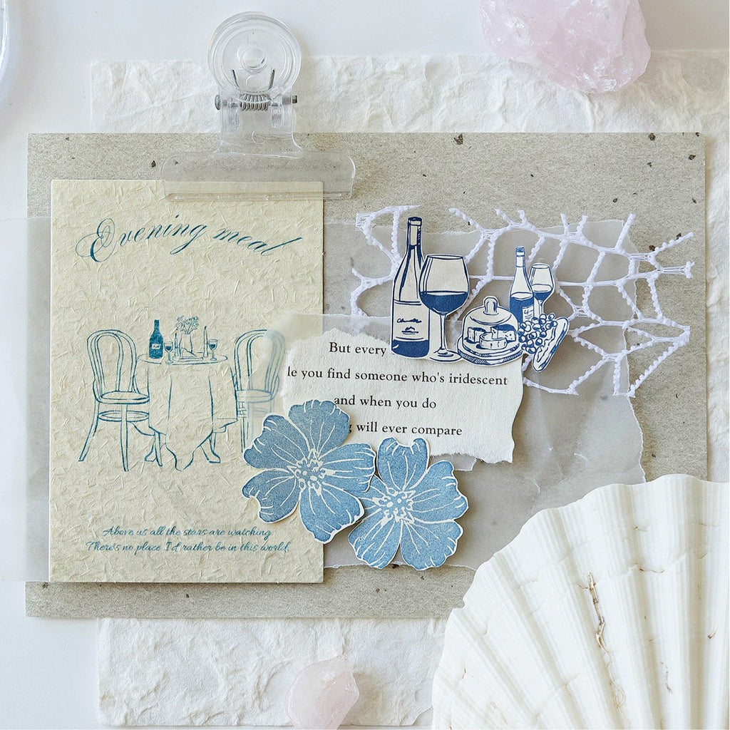 Vintage textured evening meal card layered on journal spread with shell lace blue flower stickers