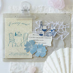Vintage textured evening meal card layered on journal spread with shell lace blue flower stickers