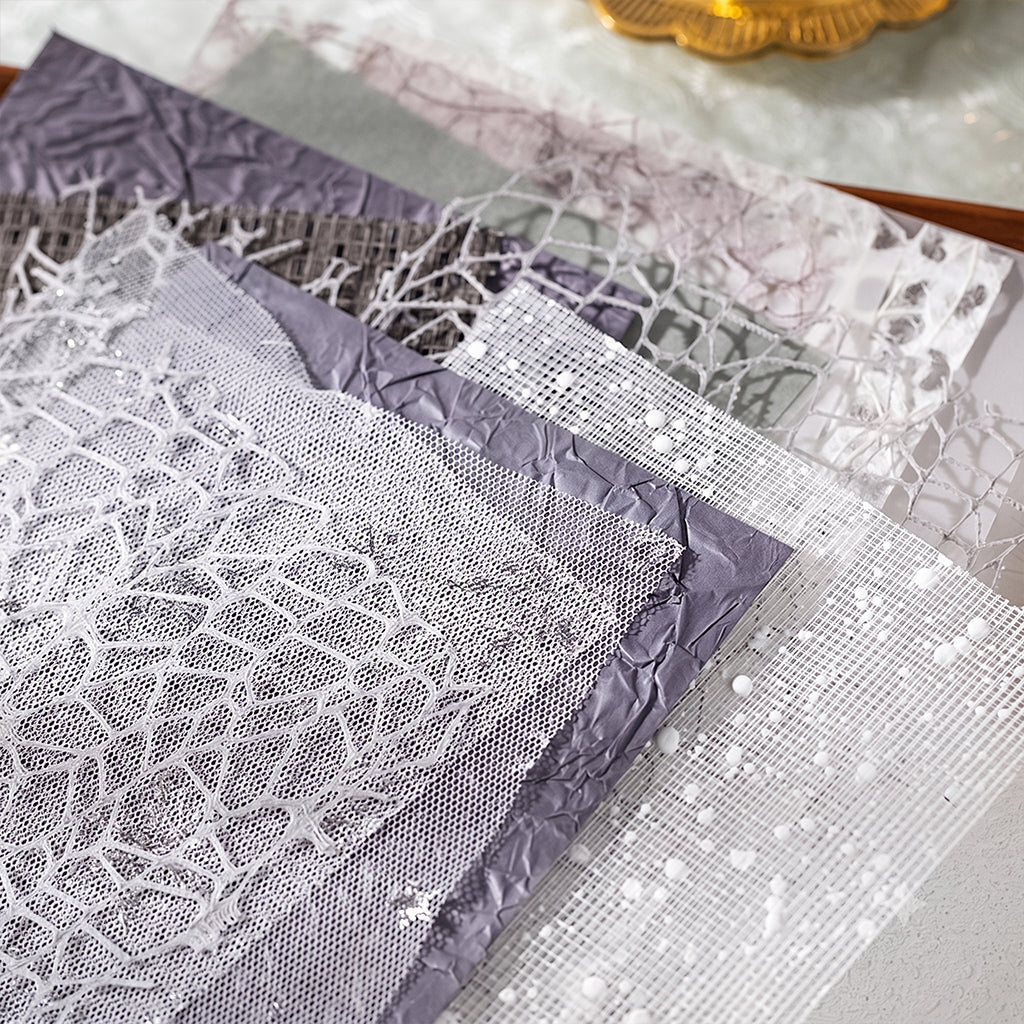 Slate grey fishnet and snowflake mesh textured papers for muted tone journal collage