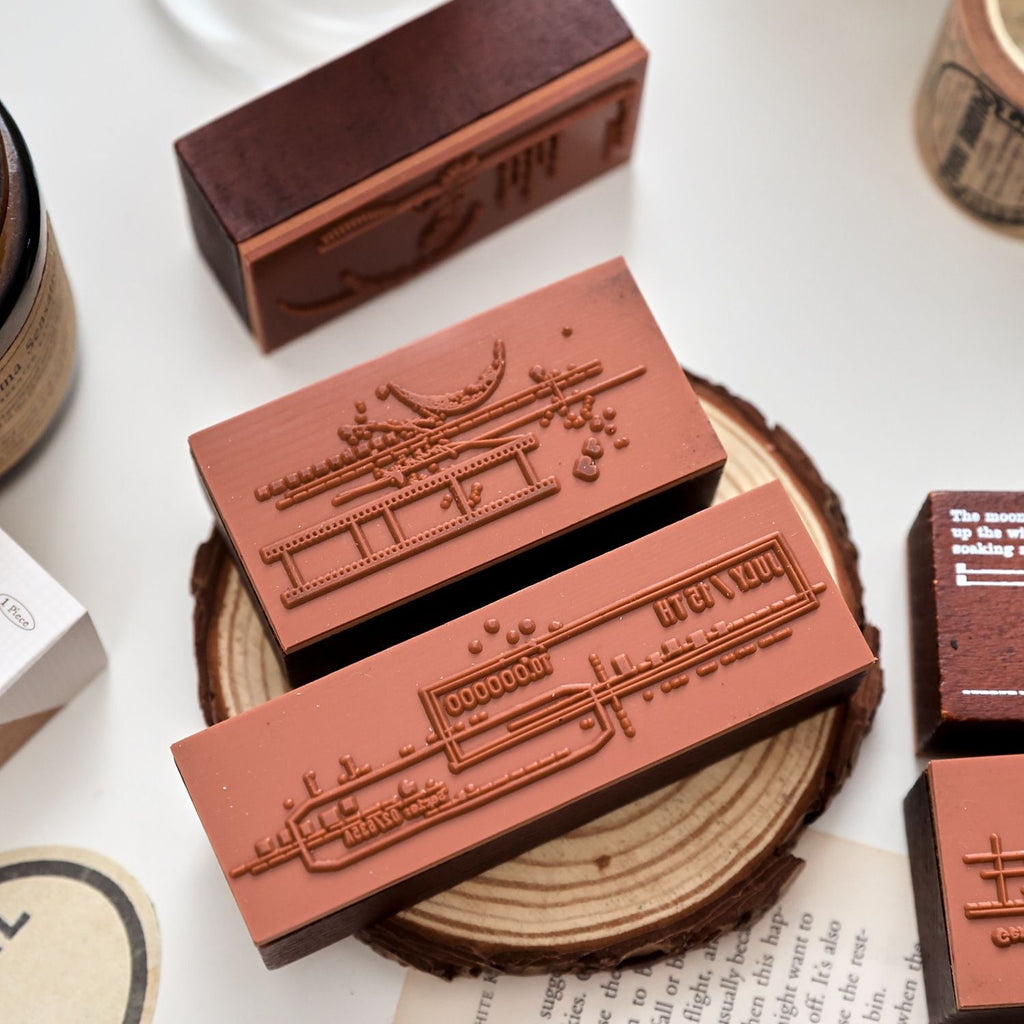 closeup of deep etched rubber stamp faces collage memory wooden stamps crisp impression detail