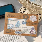 Stamped journal card and ink pad on a vintage desk setup