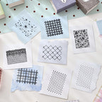 Stamped pattern impressions from textured acrylic stamps – hearts, gingham, crosshatch and polka dots in ink on paper