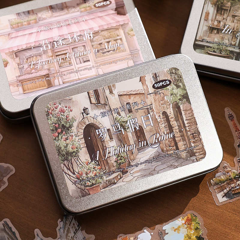 Paris edition travelogue PET sticker tins in soft pink – 50 translucent stickers of Parisian café and street scenes
