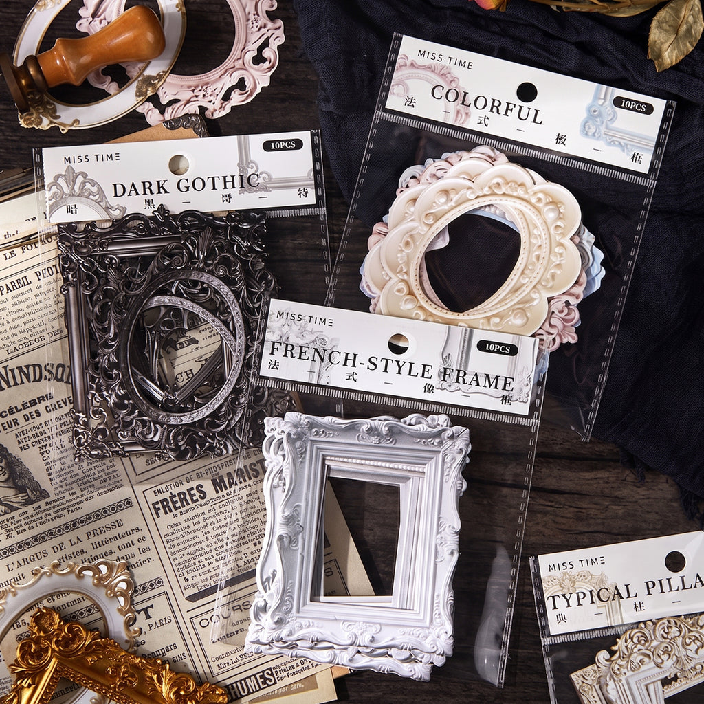 Six style 3D embossed frame sticker packs displayed on dark wood with candle and mannequin hand