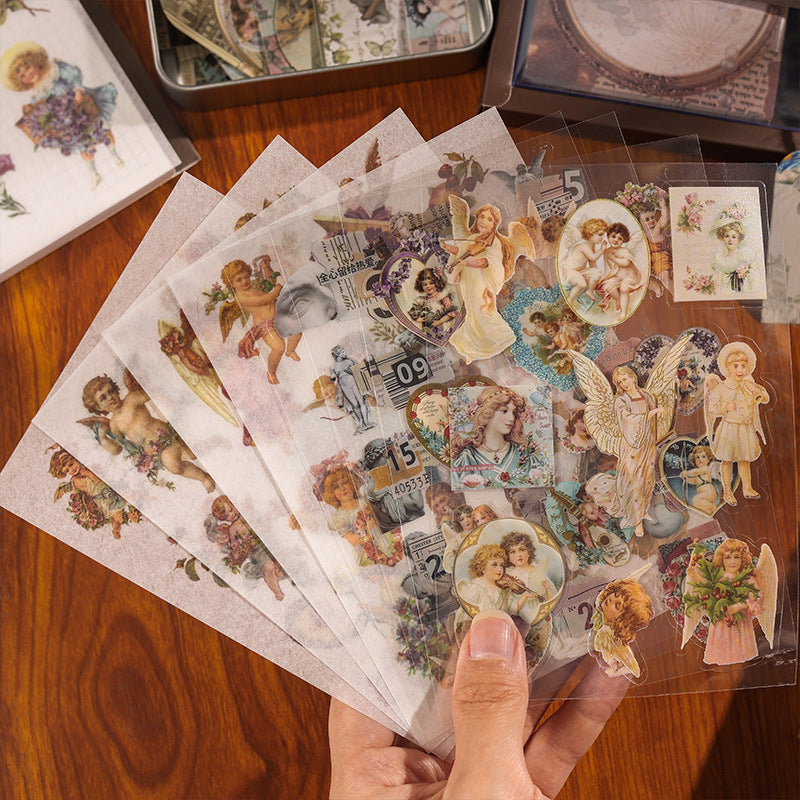 Collection of four vintage aesthetic scrapbook gift boxes: Mystic Butterfly, Vintage Botany, Emerald Manor, and Celestial Gallery, beautifully displayed on a wooden desk.