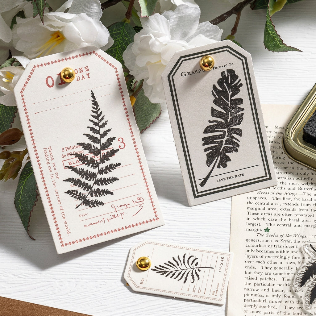 Kraft gift tags stamped with fern designs using vintage botanical clear stamps