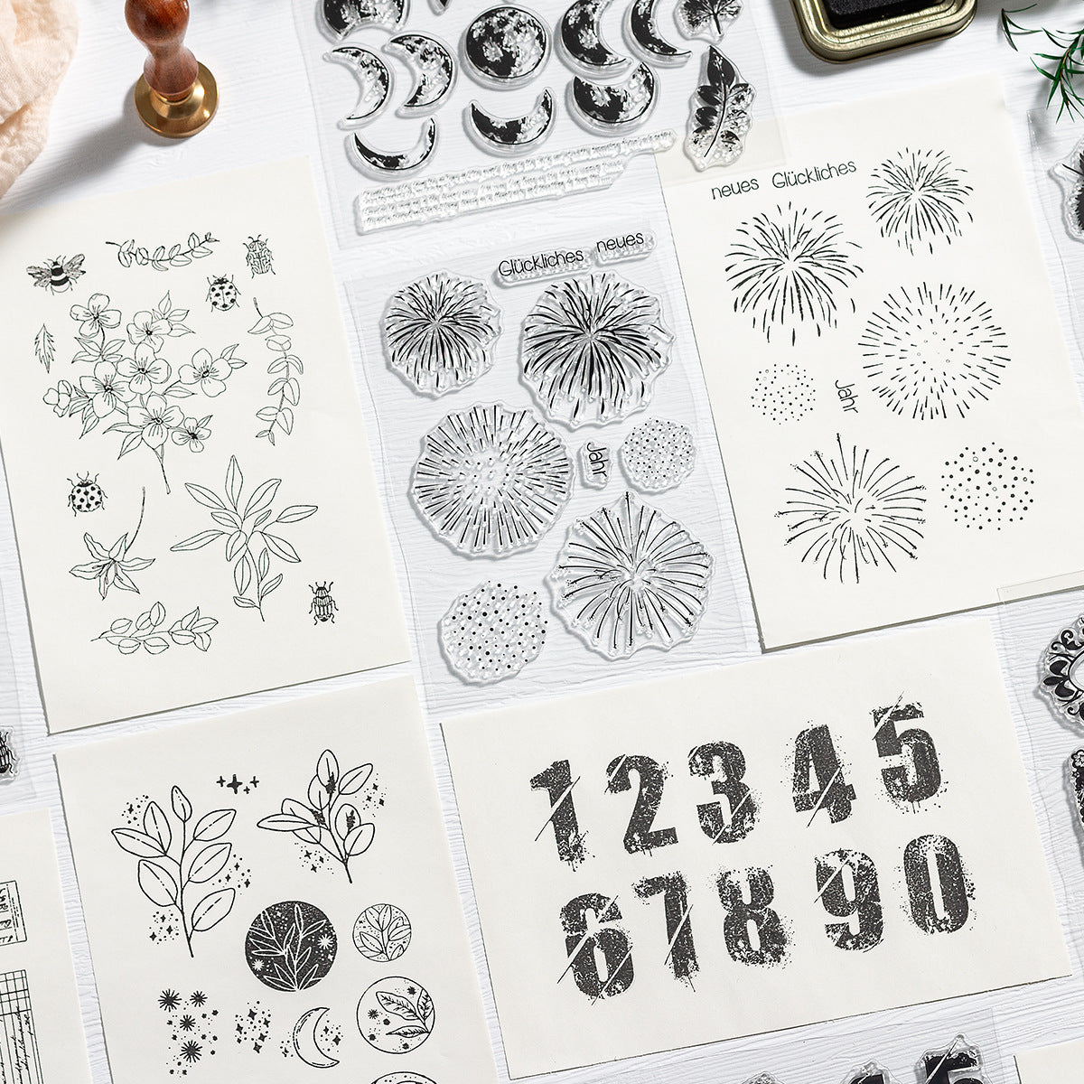 Vintage numbers and snowflake clear stamp sheets with stamped digits 12345 on paper