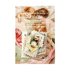 Close-up of a cherub postage stamp sticker with soft pink roses – romantic vintage style for junk journaling