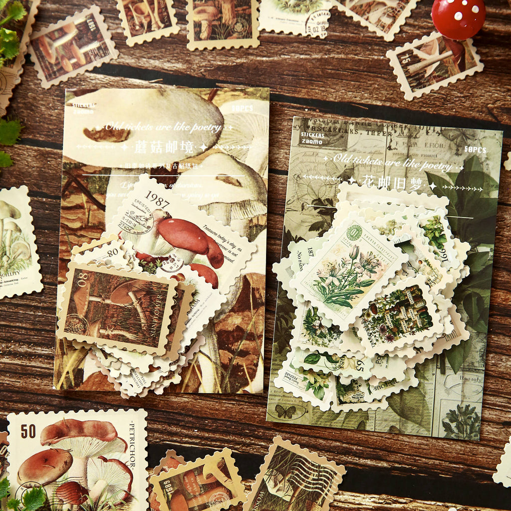 Vintage mushroom postage stamp stickers scattered on a wooden desk – die-cut perforated edges, 50 unique pieces per pack
