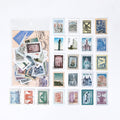 World travel vintage postage stamp stickers with landmark illustrations, muted blues and creams for travel journal ephemera.