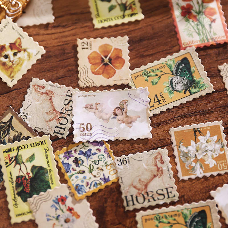 vintage postage stickers scattered flowers birds and postmarks mail art collection