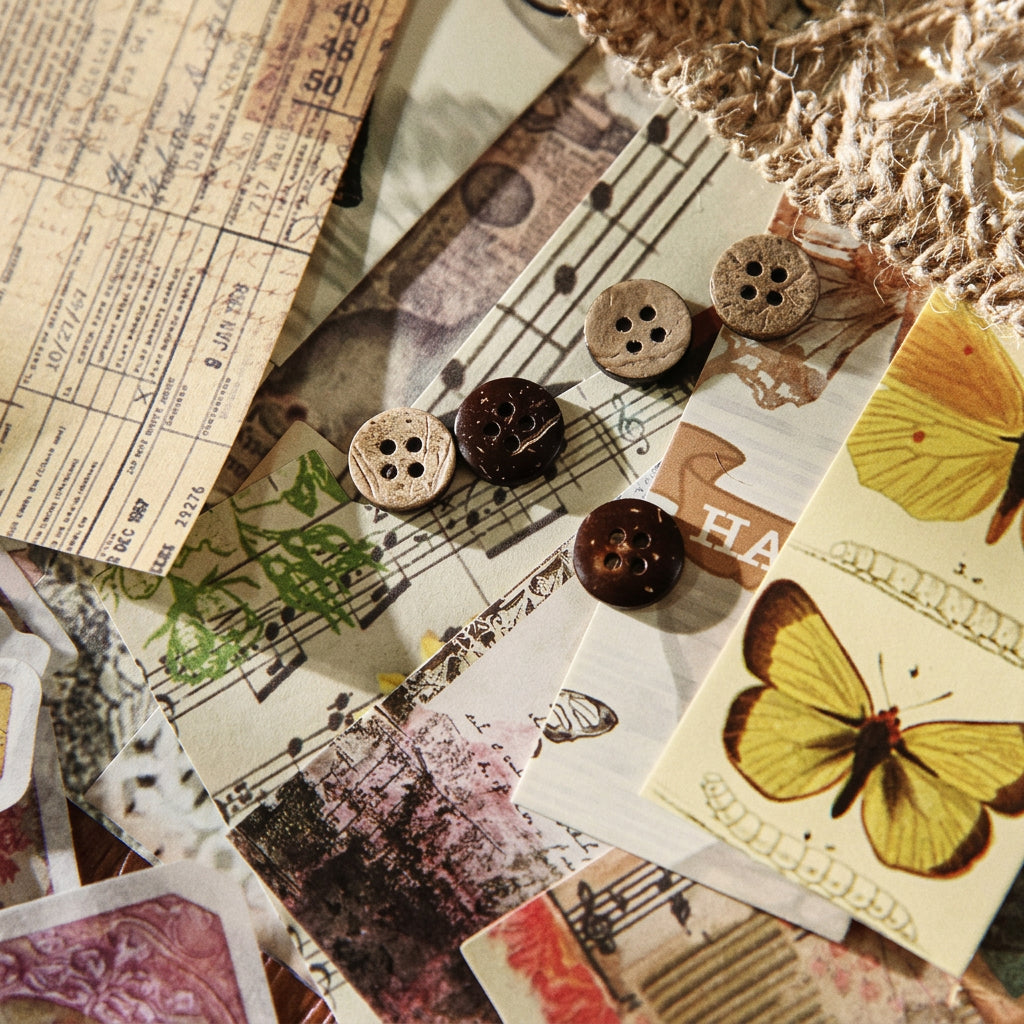 Vintage ephemera pieces with yellow butterflies, sheet music and dried botanicals from the Whispers of Time pack
