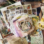 Floral color story ephemera pieces spread flat – postcards, stickers, fabric and paper sheets from the Whispers of Time pack
