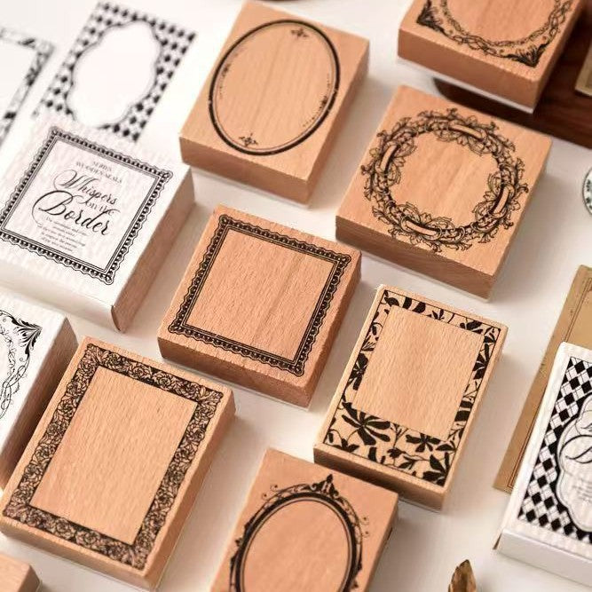 vintage border wooden stamps flat lay with printed frame impressions