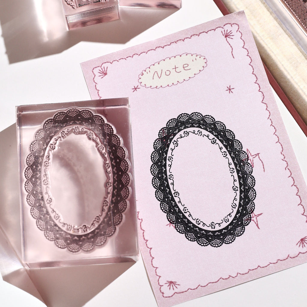lace reverie vine wreath stamp with black lace impression on pink note paper vintage journaling