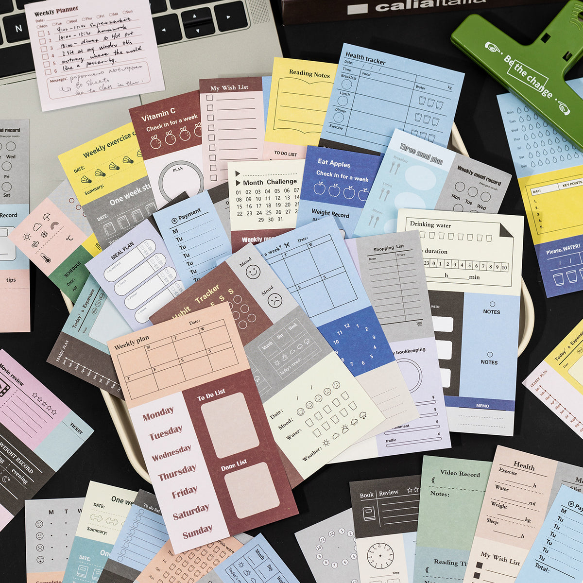 assorted writable planner sticker sheets scattered budget habit tracker daily planning layouts