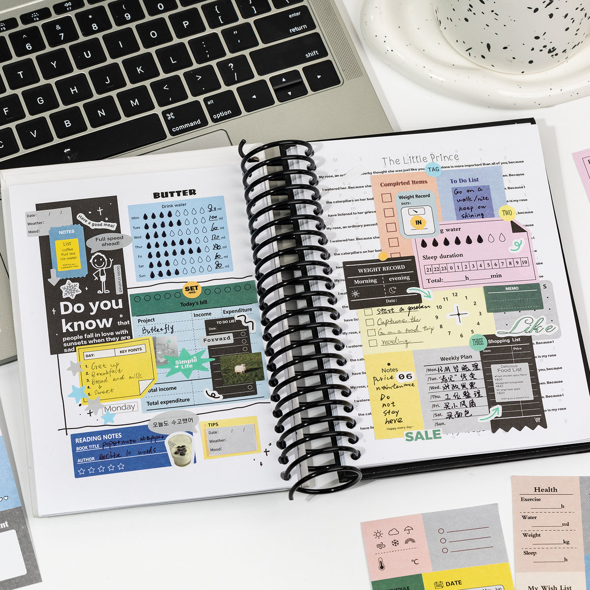 using writable planner stickers at desk with laptop budget and schedule tracking sheets