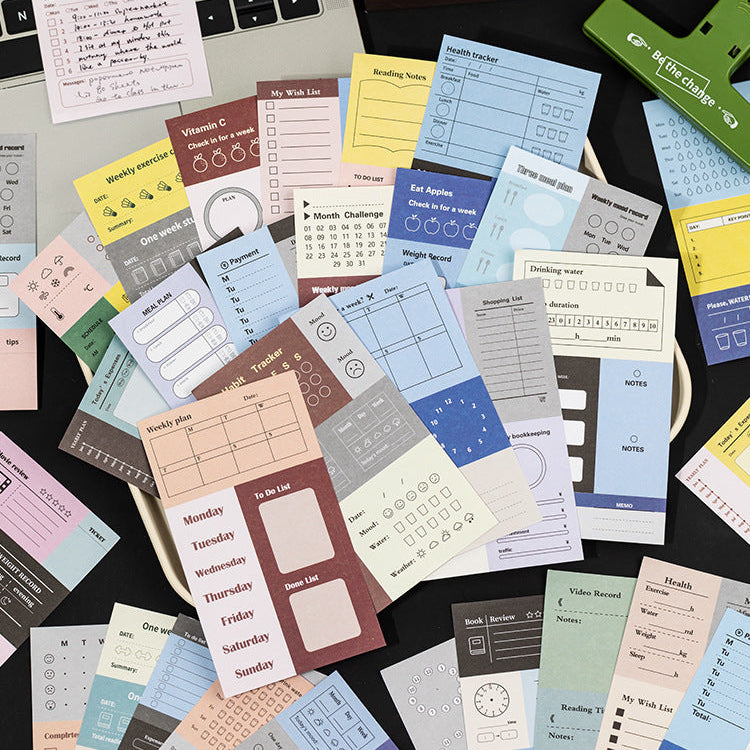 pile of writable planning sticker sheets habit tracker budget log daily schedule designs
